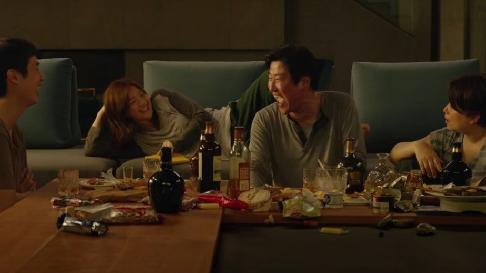 Song Kang-ho, Choi Woo-shik, Jang Hye-jin, and Park So-dam in Parasite