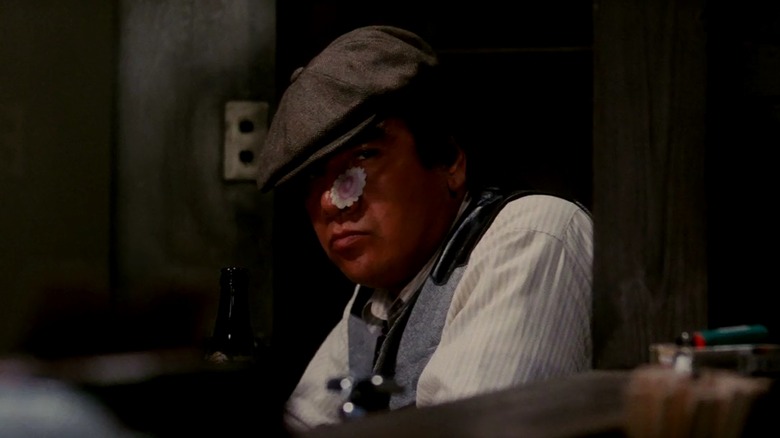 Sonny Chiba glares under hat