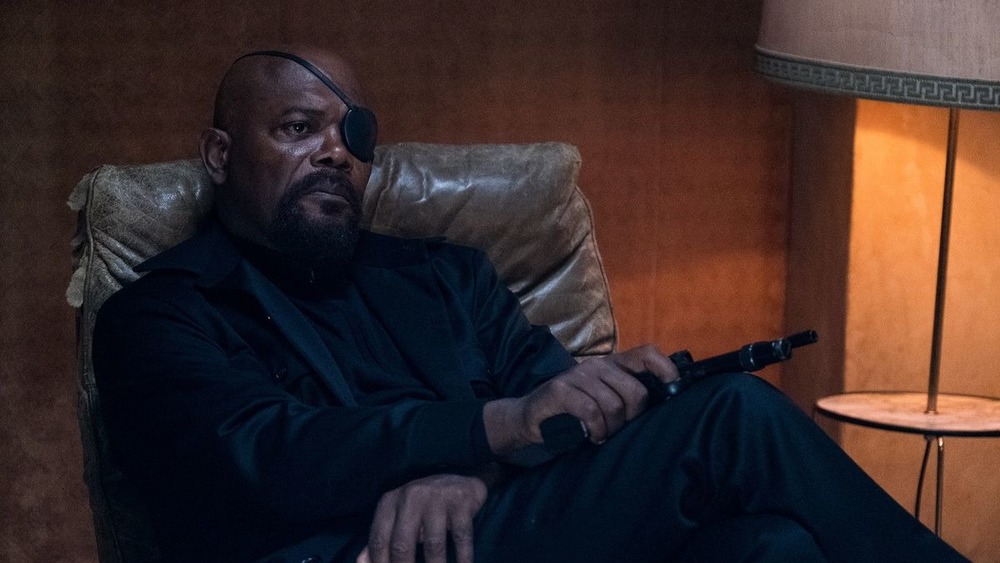 Nick Fury holding pistol