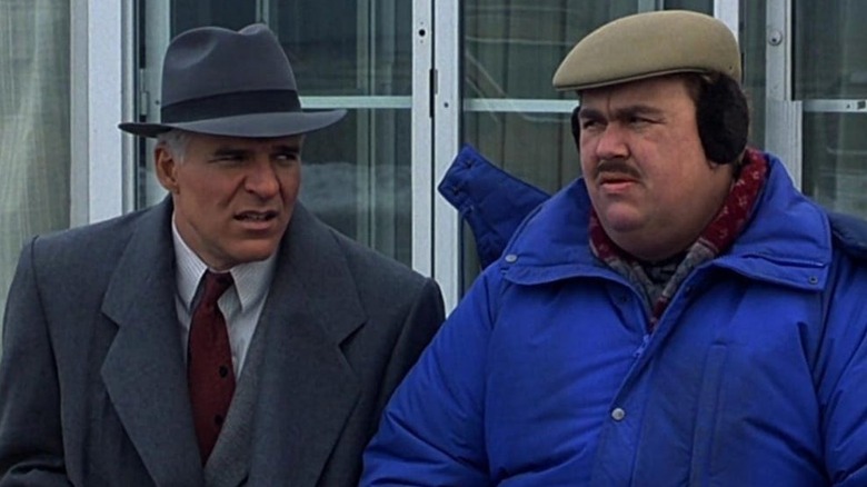 John Candy sitting with Steve Martin