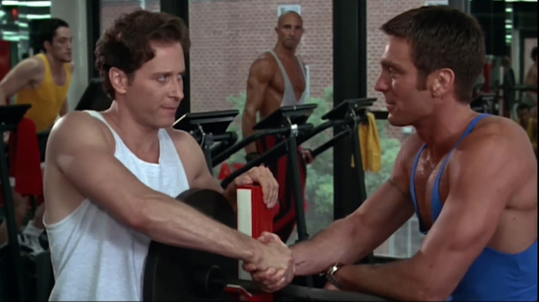 Jeffrey and Steve shaking hands in a gym