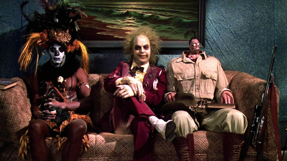 Beetlejuice sitting on couch