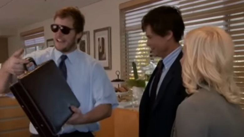 Andy gets a briefcase for Leslie and Chris