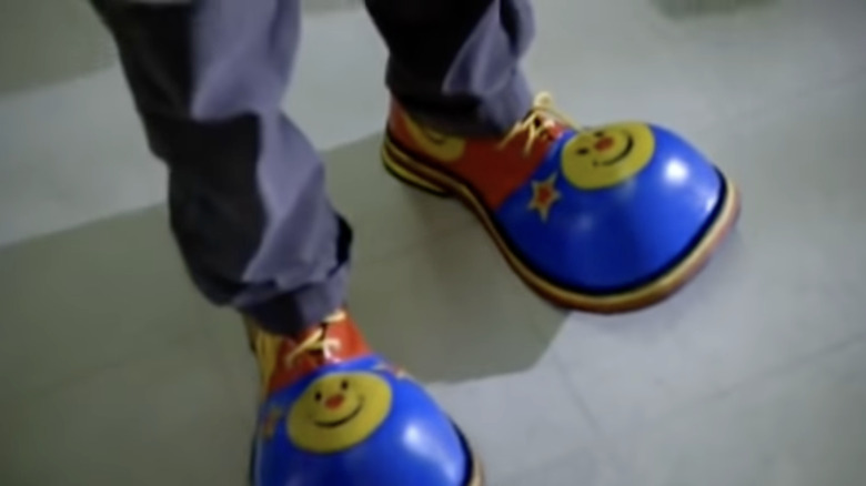 Danny Messer wearing clown shoes on CSI: New York