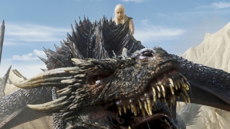 Daenerys Targaryen riding Drogon