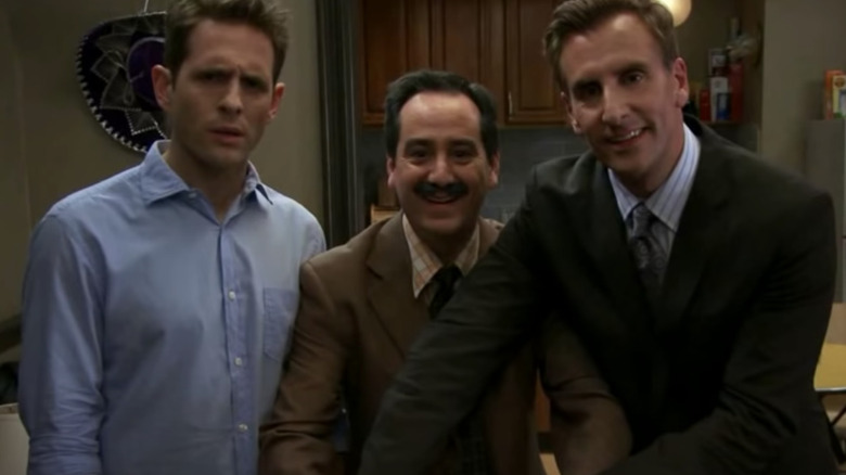 Glenn Howerton, Andrew Friedman and man look at camera