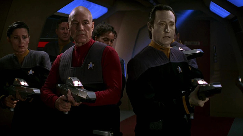 Picard and Data point their phaser rifles