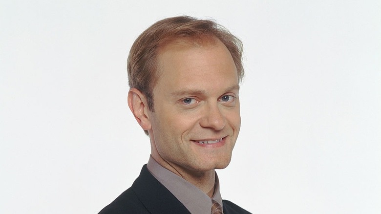 David Hyde Pierce smiles as Niles Crane