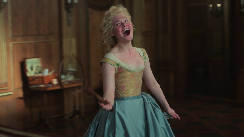 Catherine the Great holding a badminton racket and laughing maniacally