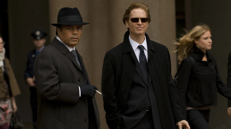 Graystone and Adama in black suits