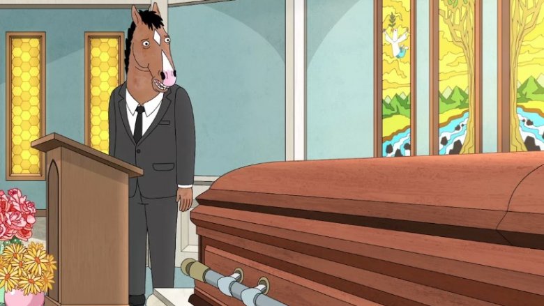 Bojack looking at a coffin