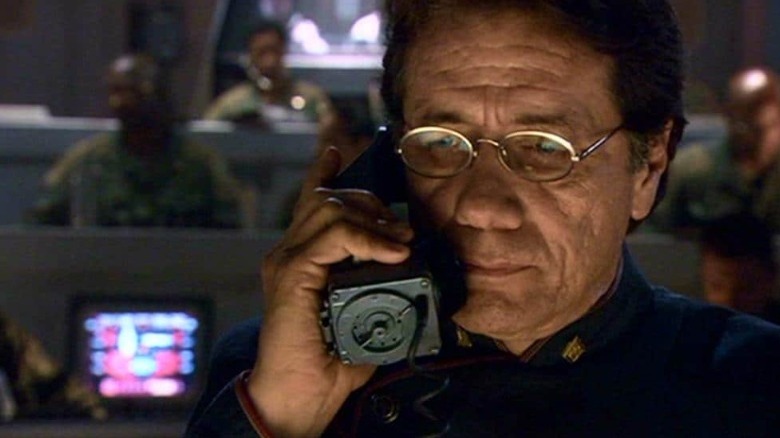 Adama makes a phone call