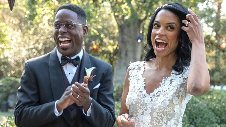 Beth and Randall smiling at their wedding