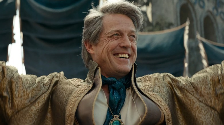 Hugh Grant smiles as Forge Fitzwilliam