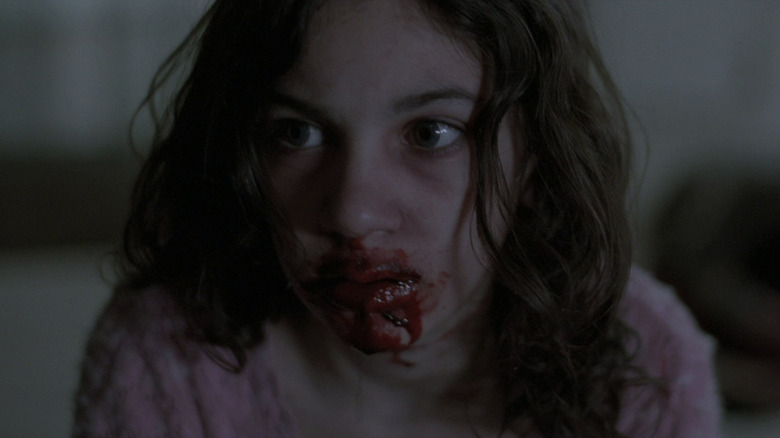 Girl with bloody mouth