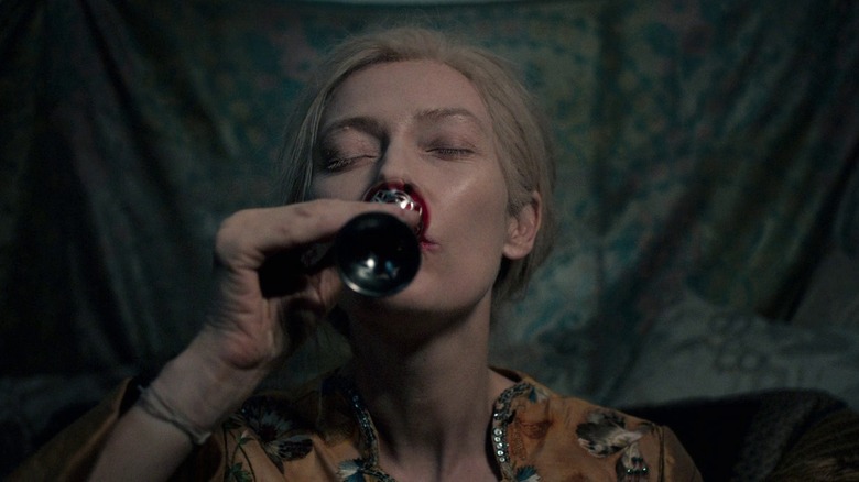 Woman drinking blood