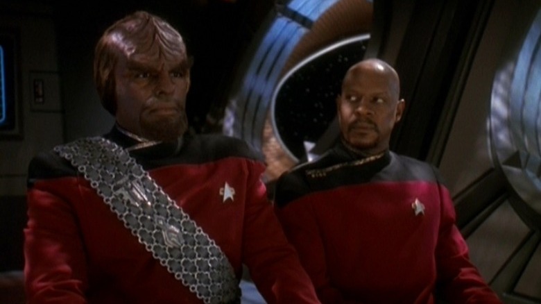 Worf and Sisko sitting together