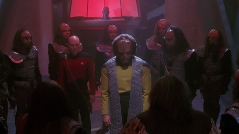 Worf and Picard surrounded by Klingons