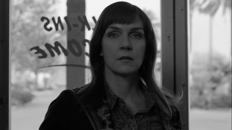 Kim stands in a legal aid office on "Better Call Saul"