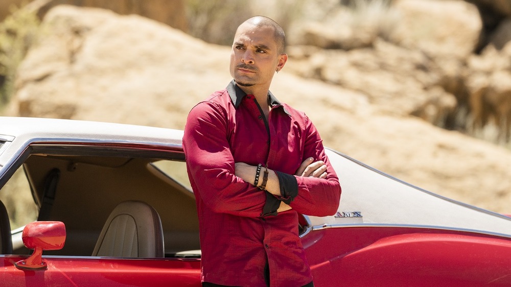 Michael Mando as Nacho Varga with red car in Better Call Saul