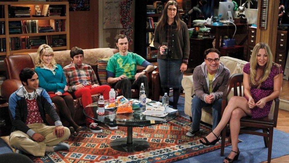 The main cast of The Big Bang Theory in the living room of Sheldon and Leonard's apartment