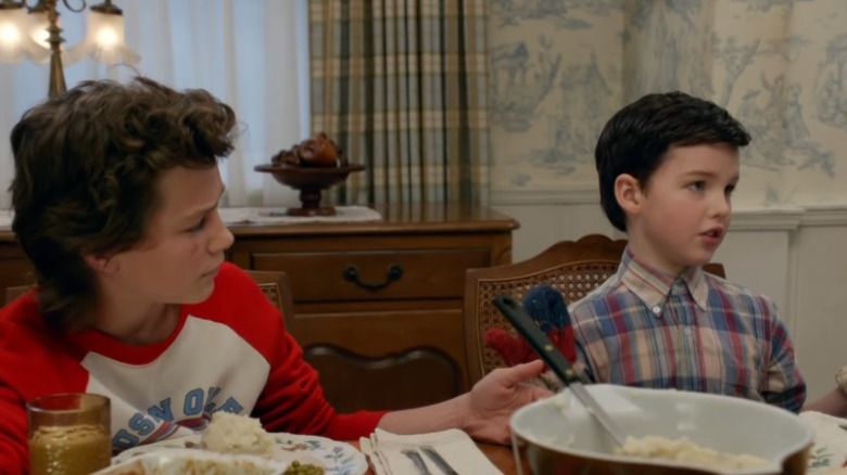 Young Sheldon and Georgie at the lunch table