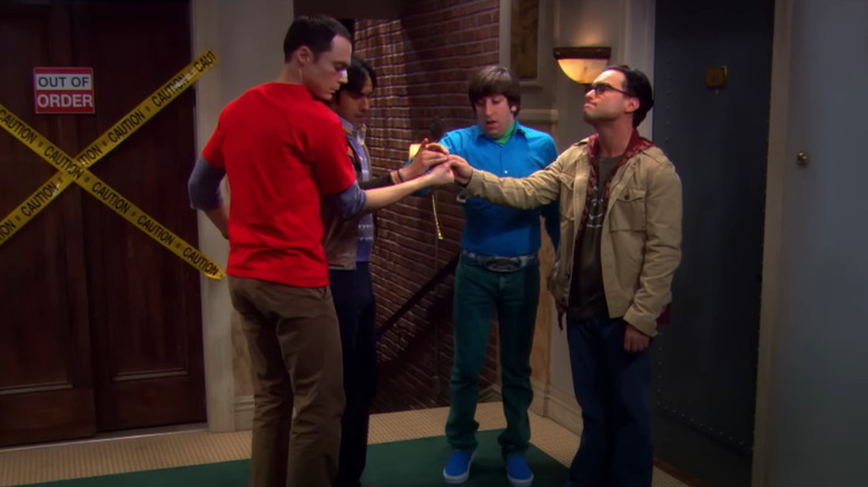 The male cast of Big Bang Theory in the hallway