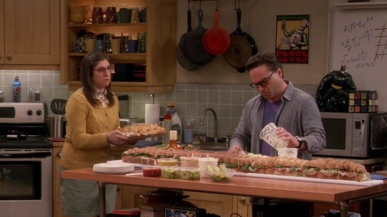 Amy and Leonard cooking