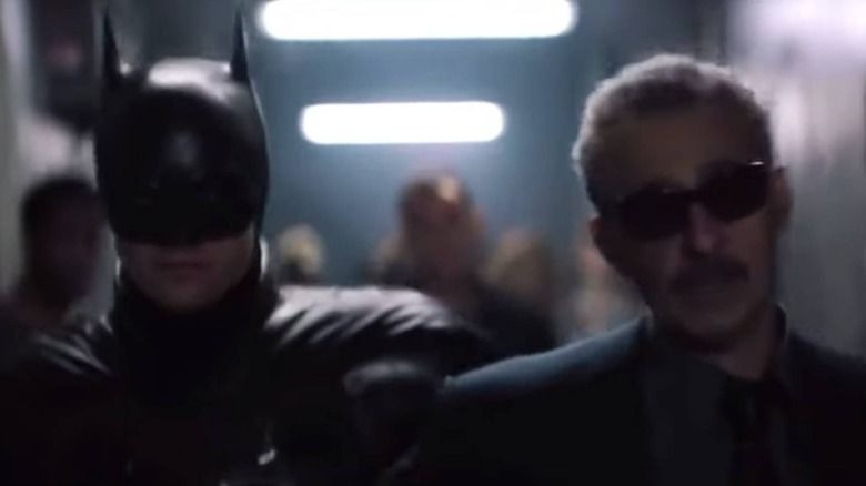 Batman escorting Carmine Falcone