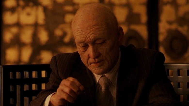 Ken Watanabe as aged Saito in Inception