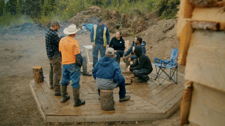 Fred Lewis and crew around the fire