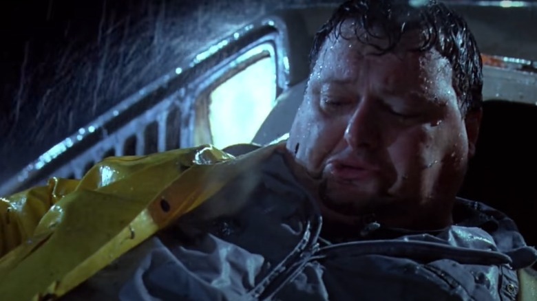 Dennis Nedry covered in dinosaur slime