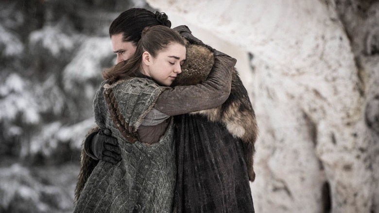 Kit Harrington hugging Maisie Williams Game of Thrones