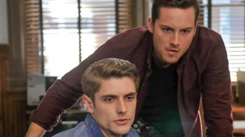 Sam Hunt and Jesse Lee Soffer at desk