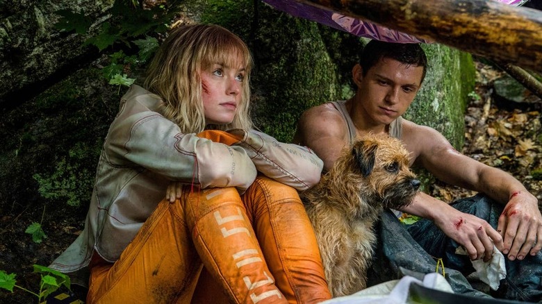 Daisy Ridley and Tom Holland staying dry