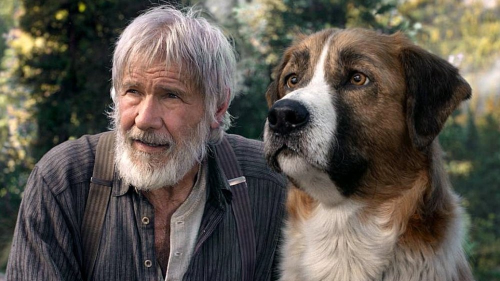 Harrison Ford as John Thornton with Buck in The Call of the Wild