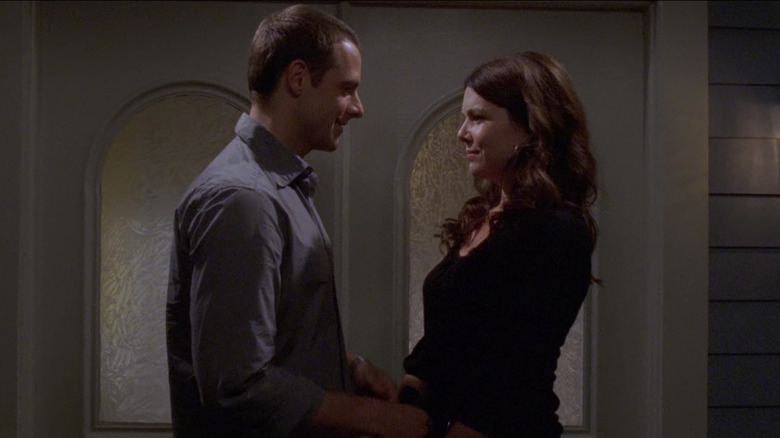 Lorelai and Christopher looking at each other