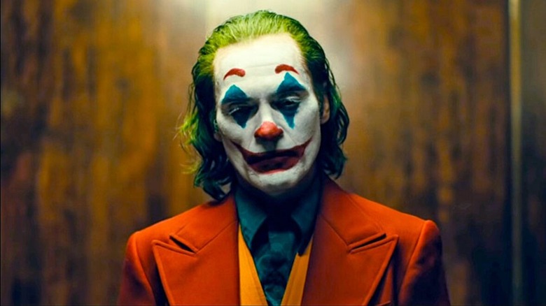 Joker riding in the elevator