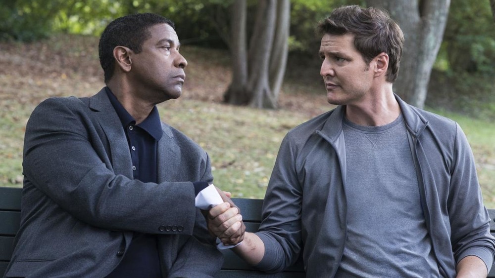 Denzel Washington and Pedro Pascal shaking hands