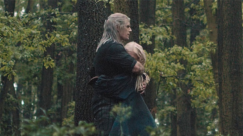 Geralt and Ciri hug in The Witcher