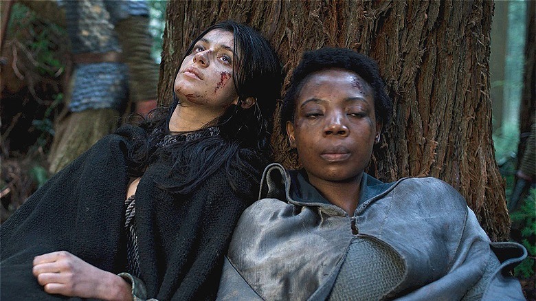 Yen and Fringilla leaning against a tree The Witcher