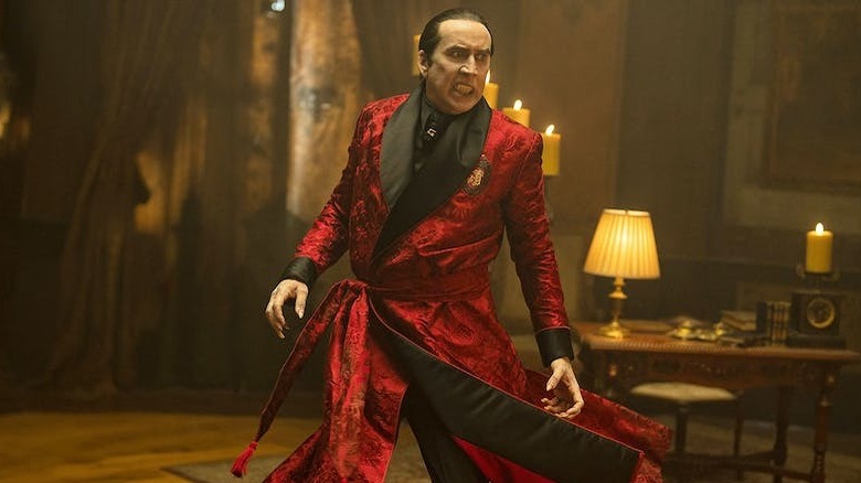 Dracula twirls in dress robe