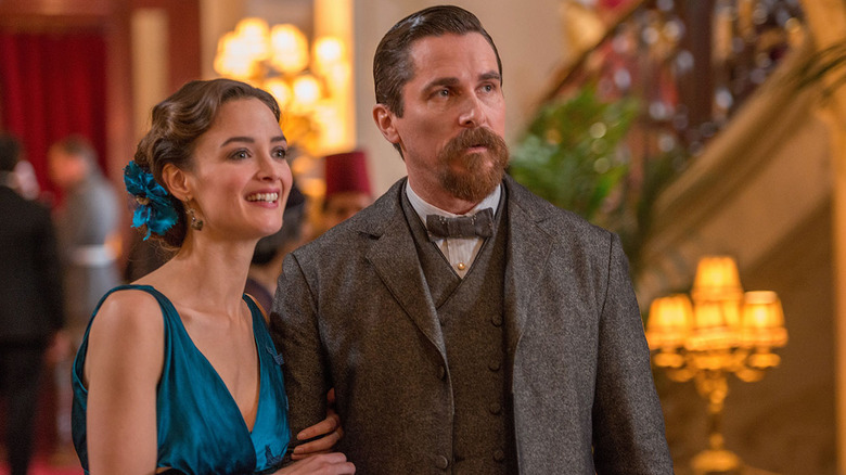 Charlotte Le Bon and Christian Bale in The Promise