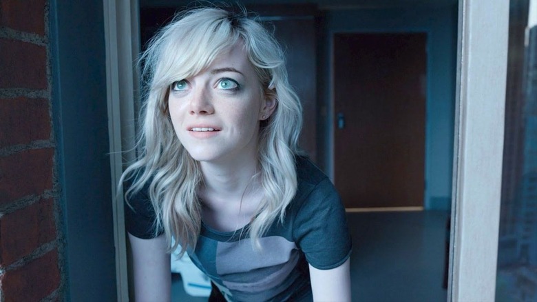 Emma Stone looks up at sky