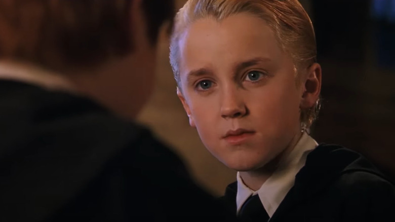 Draco looks at Ron