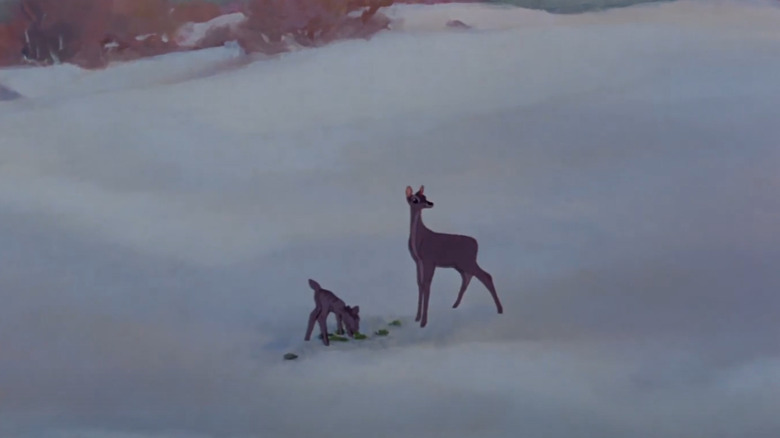 Bambi's mother looks towards hunter