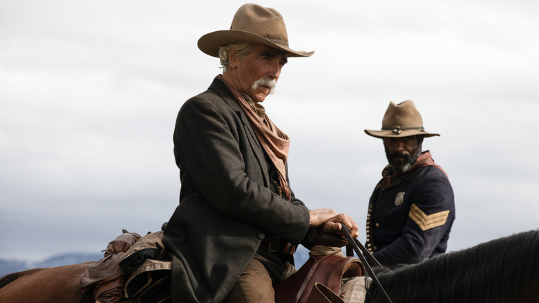 Sam Elliott and LaMonica Garrett riding horses