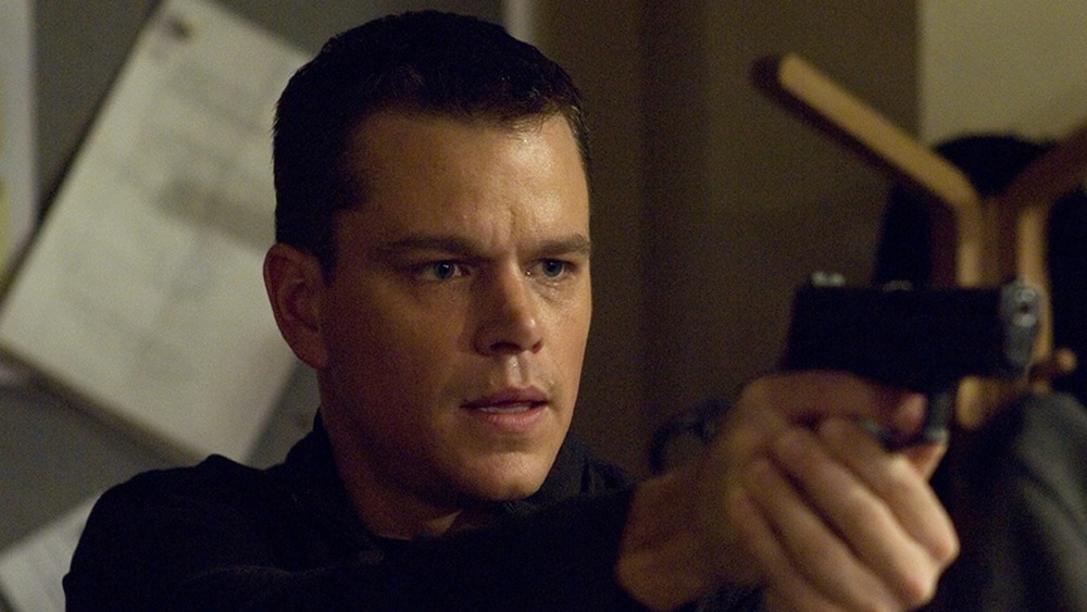 Matt Damon Jason Bourne gun