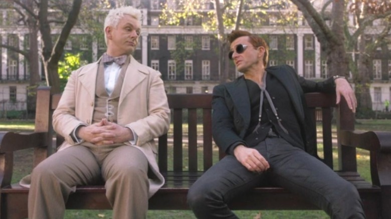 Aziraphale and Crowley sitting on a bench