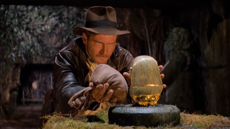 Indiana Jones stealing a golden idol